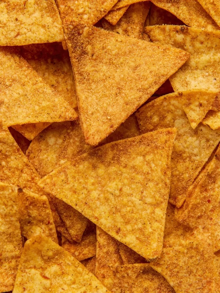 Close-up view of golden crispy tortilla chips showing crunchy texture